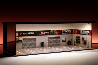 Yokohama Tire Workshop Garage Diorama – 1:64 Scale Acrylic Diorama (30x14x10 cm)