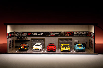 Yokohama Tire Workshop Garage Diorama – 1:64 Scale Acrylic Diorama (30x14x10 cm)